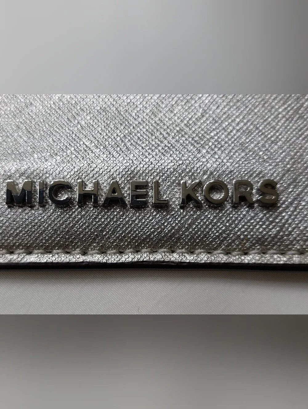 Michael Kors Metallic Silver Logo Clutch Wallet